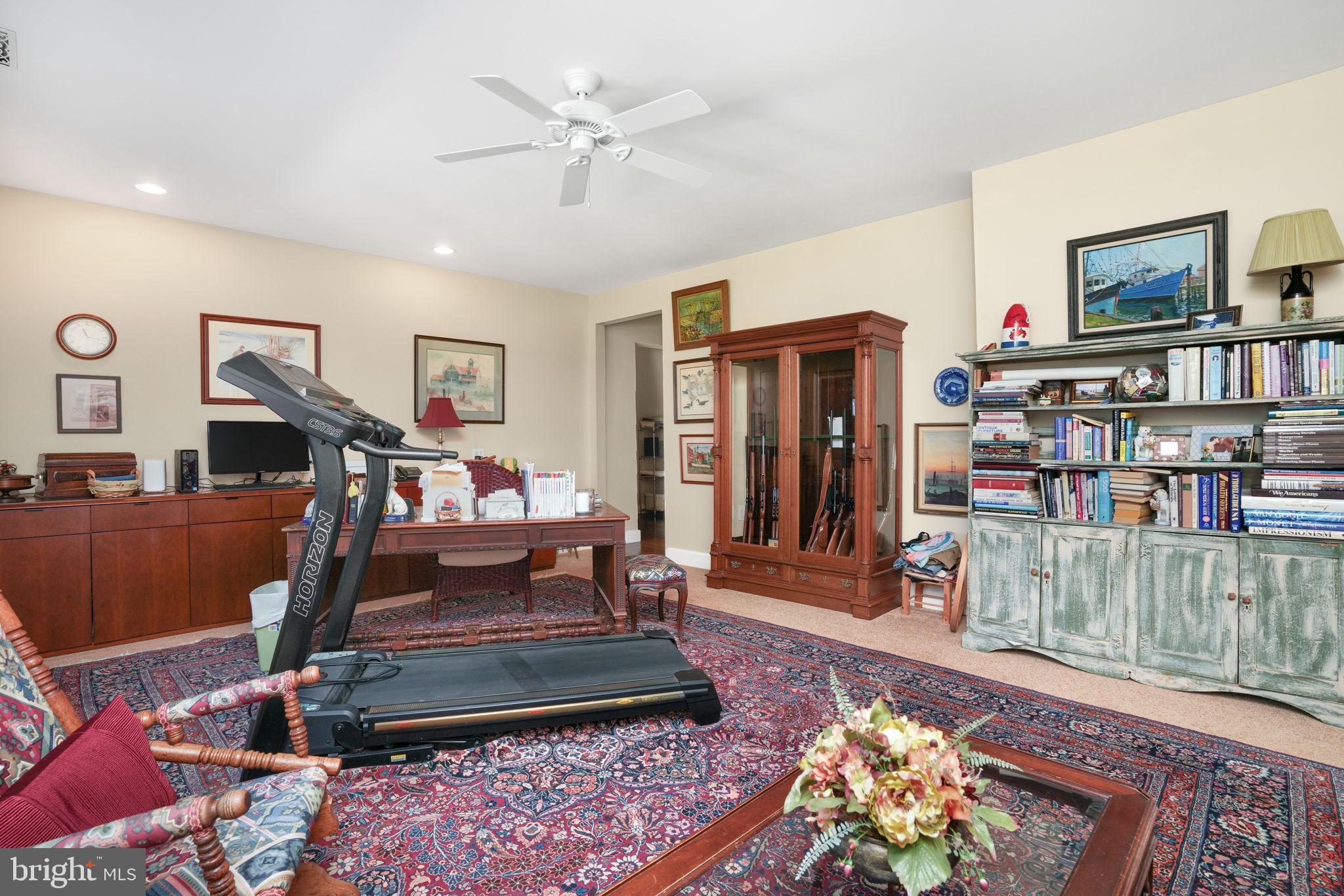 6513 Hampton Road Berlin, MD 21811 - Photo 76 of 129 a living room with lots of furniture and a rug