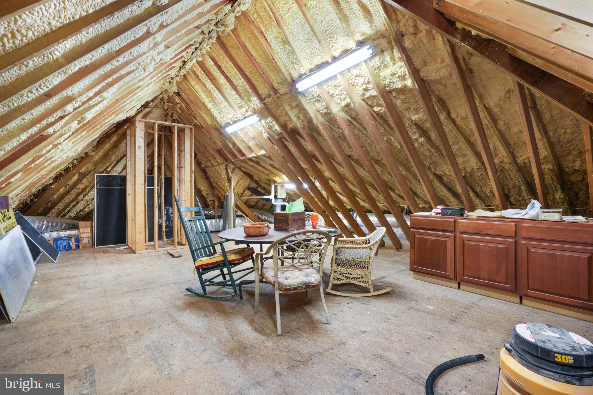 6513 Hampton Road Berlin, MD 21811 - Photo 99 of 129 a view of a chairs and table in the back yard of the house