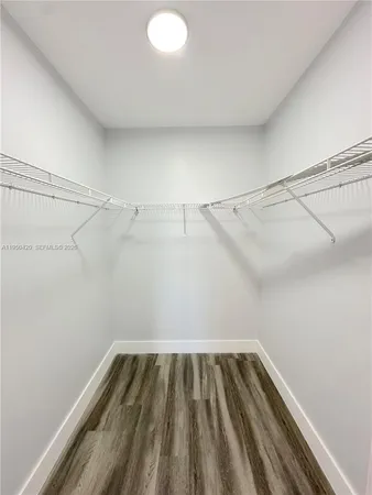 a view of a room with racks on the wall