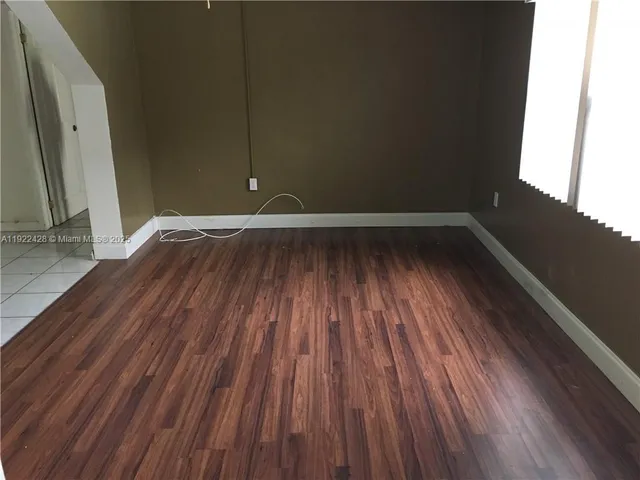 a view of an empty room with window