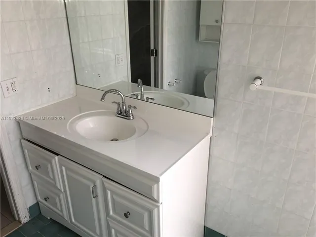 a view of swimming pool with a yard