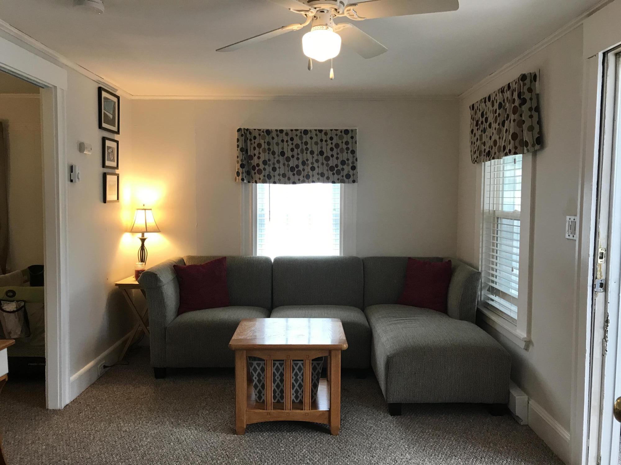 31 Agawam Beach Road Wareham, MA 02571 - Photo 6 of 14 a living room with furniture a window and a flat screen tv