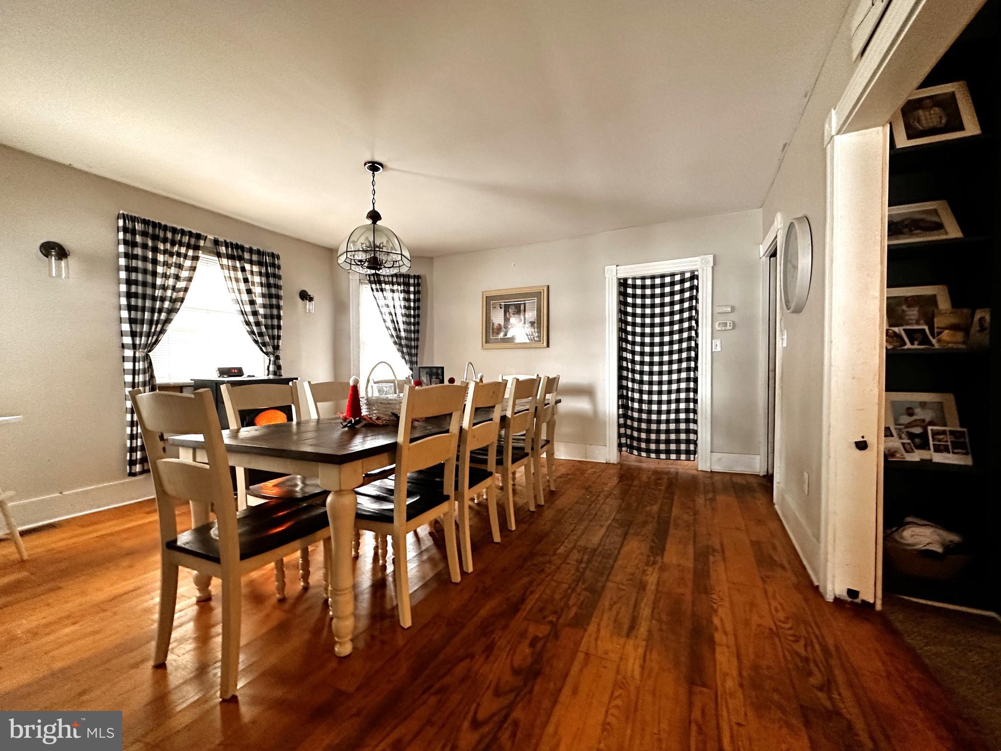 210 Old Line Road Goldsboro, MD 21636 - Photo 11 of 27 a view of a dining room with furniture and wooden floor