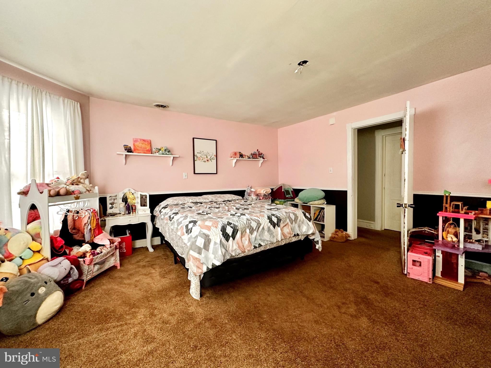 210 Old Line Road Goldsboro, MD 21636 - Photo 14 of 27 a bedroom with a bed and a window