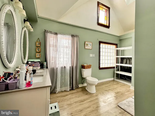 a living room with furniture and a gate