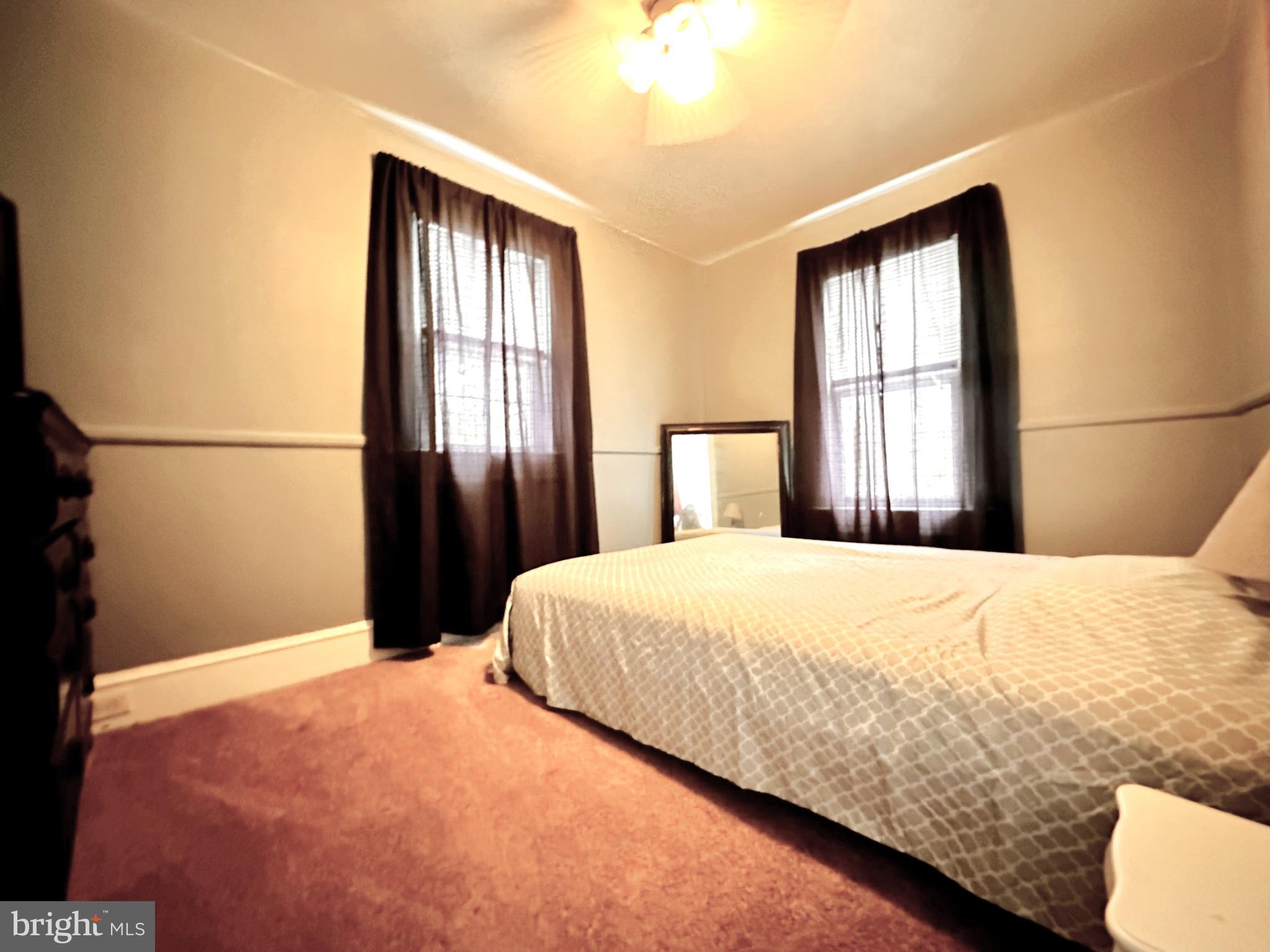 210 Old Line Road Goldsboro, MD 21636 - Photo 18 of 27 a bedroom with a bed and a window