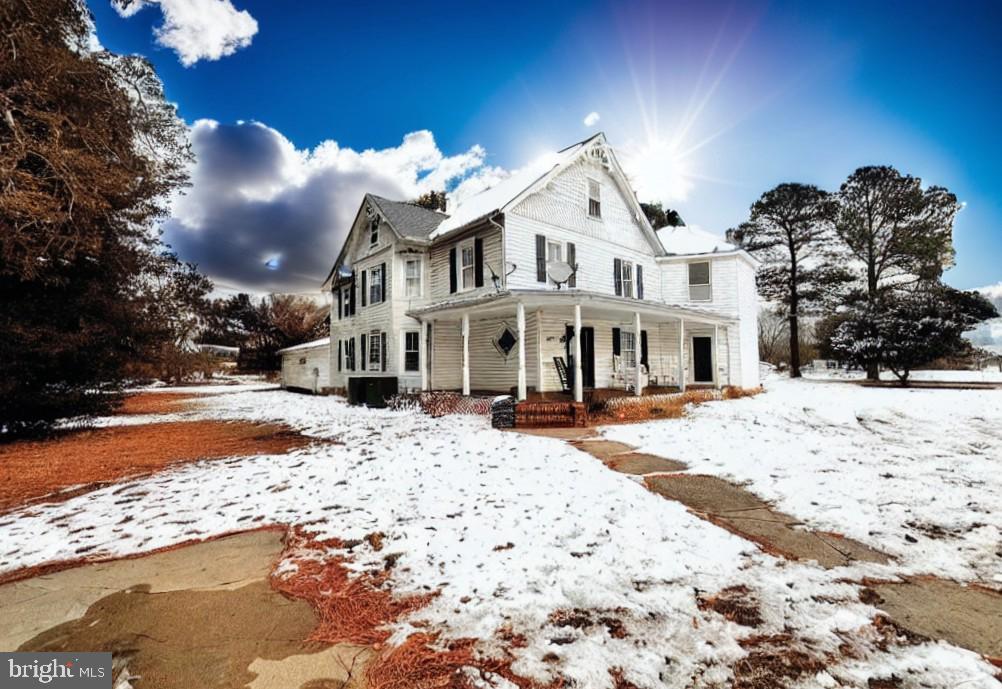 210 Old Line Road Goldsboro, MD 21636 - Photo 2 of 27 a view of a house with snow on the road