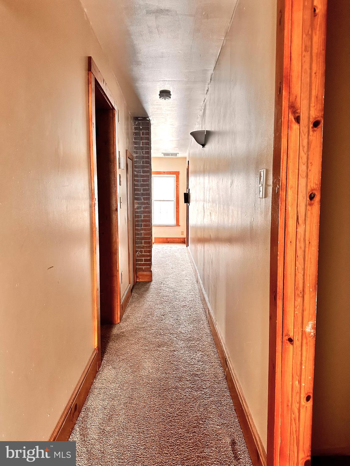 210 Old Line Road Goldsboro, MD 21636 - Photo 25 of 27 a view of a hallway with wooden floor