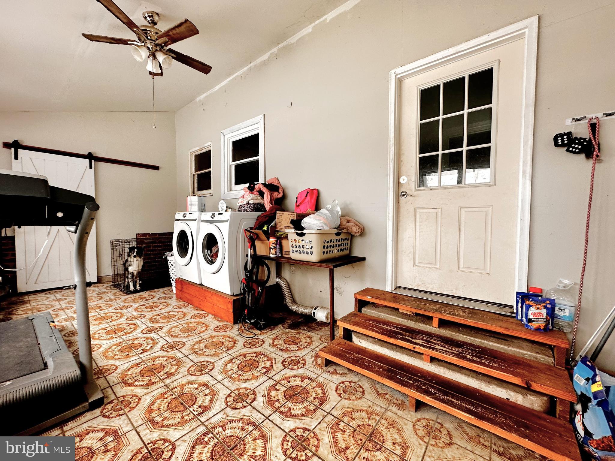 210 Old Line Road Goldsboro, MD 21636 - Photo 26 of 27 a living room with furniture and a flat screen tv