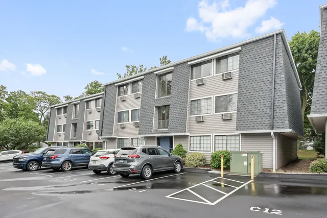 a car parked in front of a building