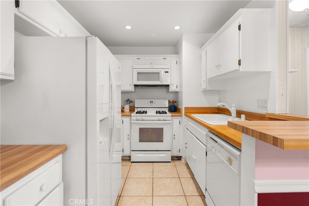12620 Briarglen Loop, Unit K Stanton, CA 90680 - Photo 14 of 28 Butcher block style counters.