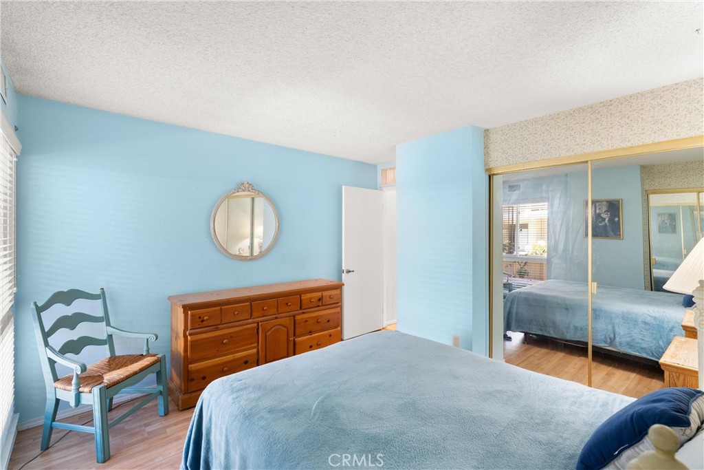 12620 Briarglen Loop, Unit K Stanton, CA 90680 - Photo 21 of 28 Two mirrored closets in the bedroom.