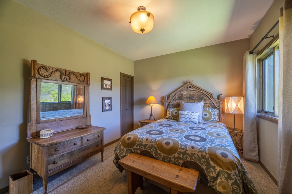 118 Topaz Road Silverthorne, CO 80498 - Photo 20 of 34 Lower level guest bedroom offers privacy and views to Williams Fork Range