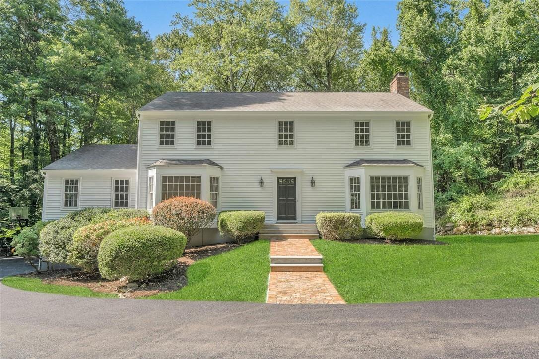 32 Hoyt Road Pound Ridge, NY 10576 - Photo 1 of 1 Colonial house featuring a front yard