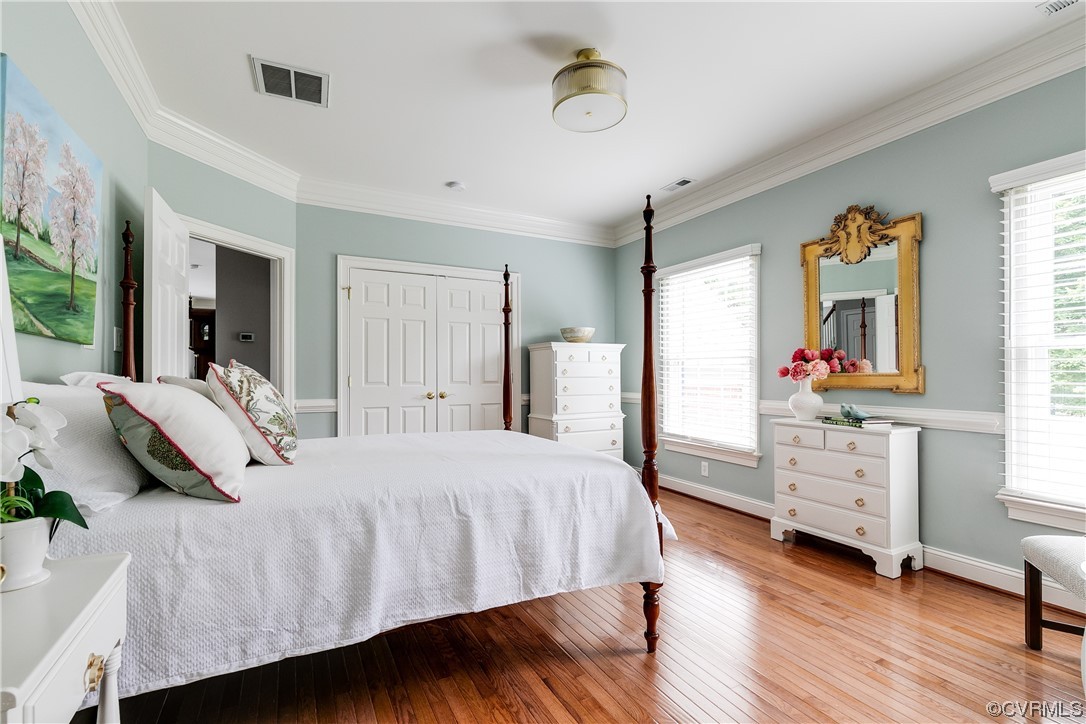 508 Raleigh Manor Road Henrico, VA 23229 - Photo 19 of 25 a bedroom with a bed and a dresser
