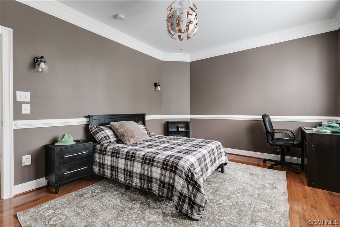 508 Raleigh Manor Road Henrico, VA 23229 - Photo 21 of 25 a bedroom with a bed and a desk