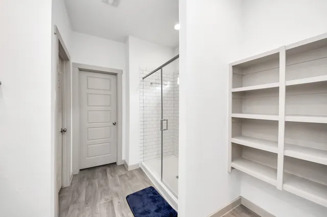 a view of an empty walk in closet