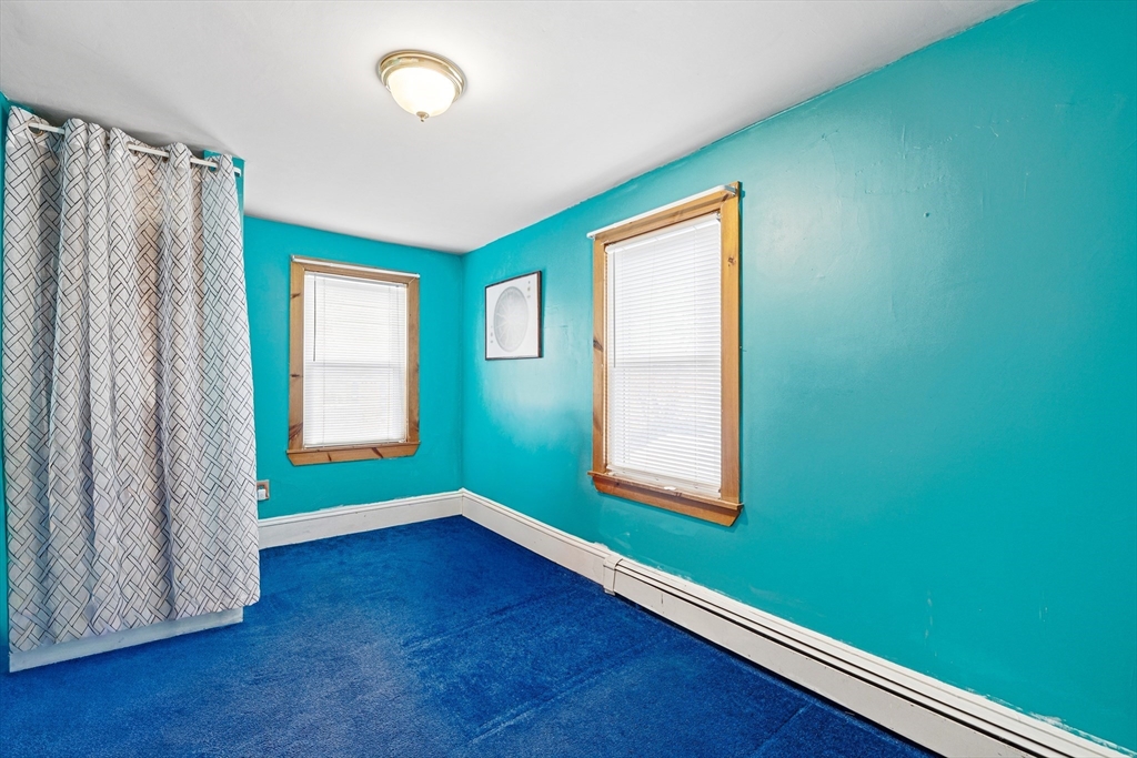 20 Rosseter Street Boston, MA 02121 - Photo 11 of 24 a view of room with window and hardwood floor