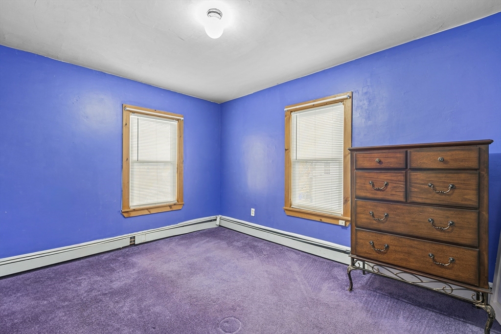 20 Rosseter Street Boston, MA 02121 - Photo 13 of 24 a view of an empty room with a window