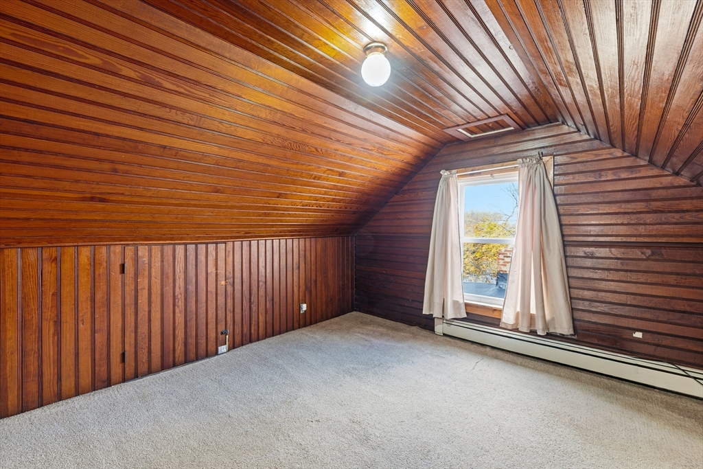 20 Rosseter Street Boston, MA 02121 - Photo 16 of 24 an empty room with wooden floor and windows