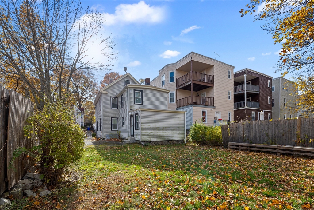 20 Rosseter Street Boston, MA 02121 - Photo 21 of 24 a view of a house with a garden