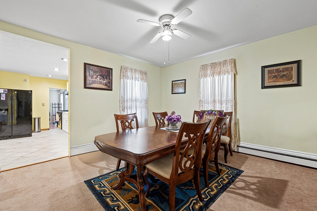 20 Rosseter Street Boston, MA 02121 - Photo 4 of 24 a view of a dining room with furniture