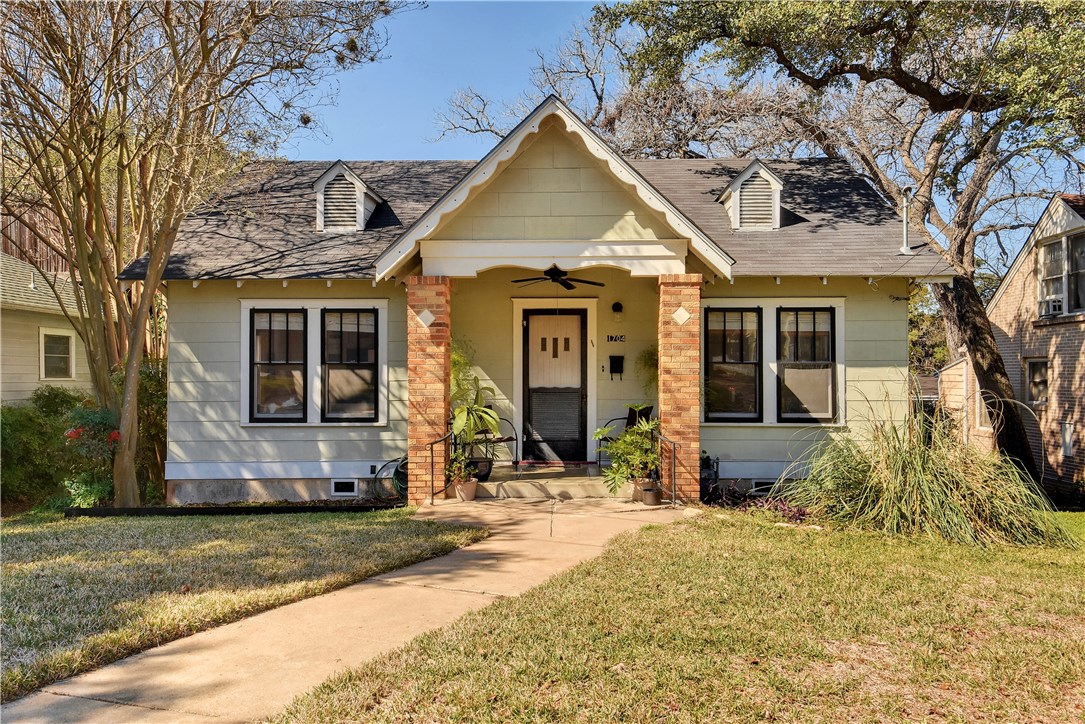 a front view of house with yard