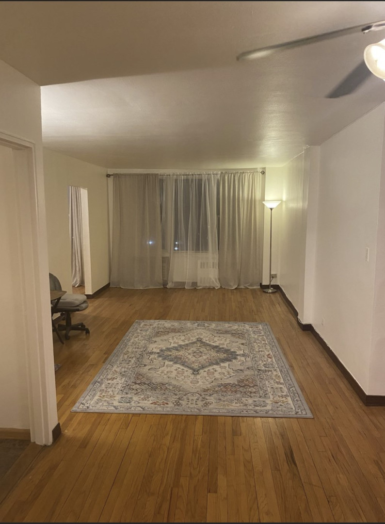 2385 Barker Avenue, Unit 5L Bronx, NY 10467 - Photo 3 of 15 a view of a livingroom with wooden floor