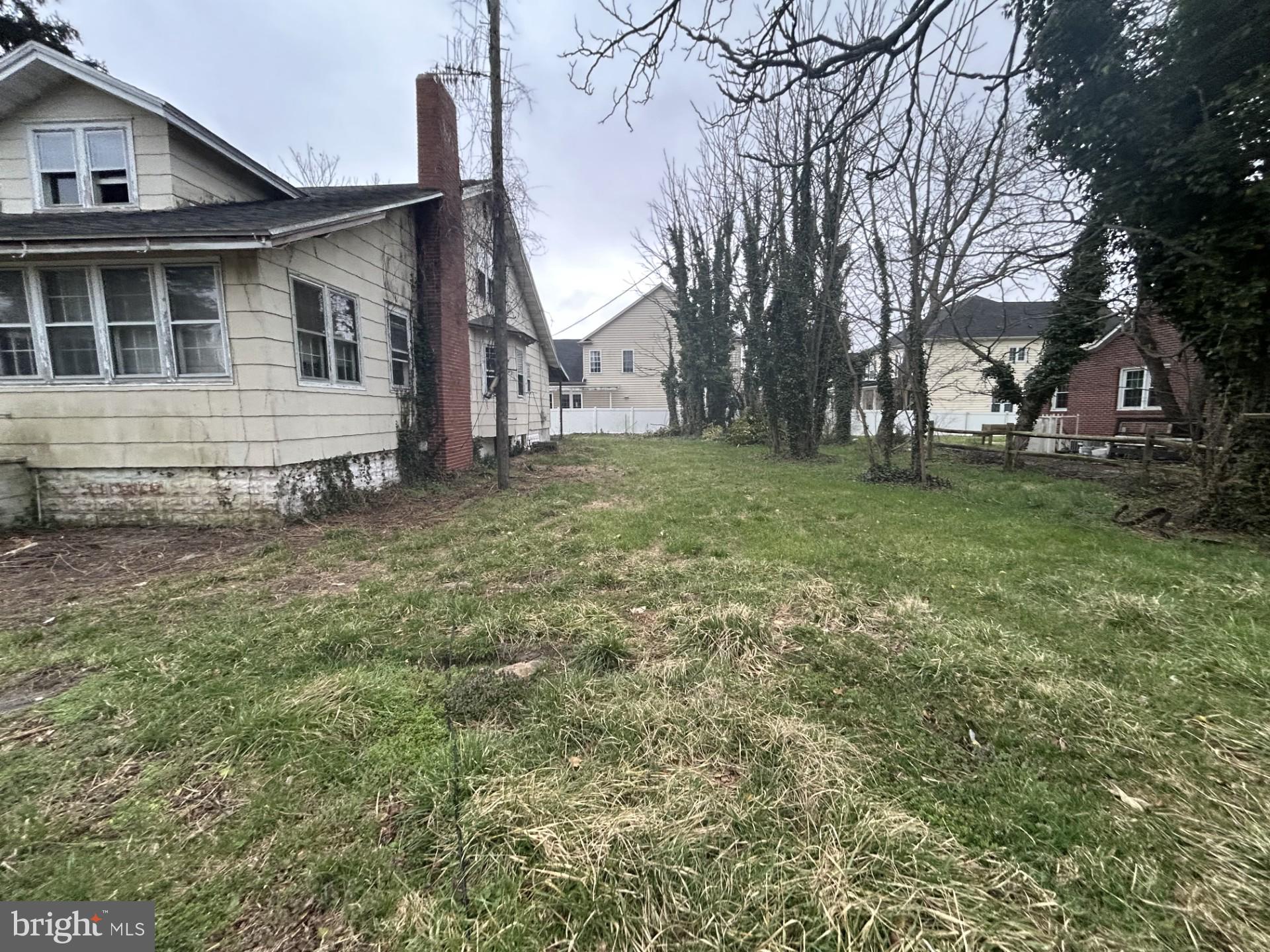 723 Chestnut Street Milton, DE 19968 - Photo 2 of 7 a view of a house with a yard