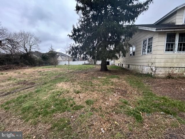 723 Chestnut Street Milton, DE 19968 - Photo 4 of 7 a view of a house with a yard