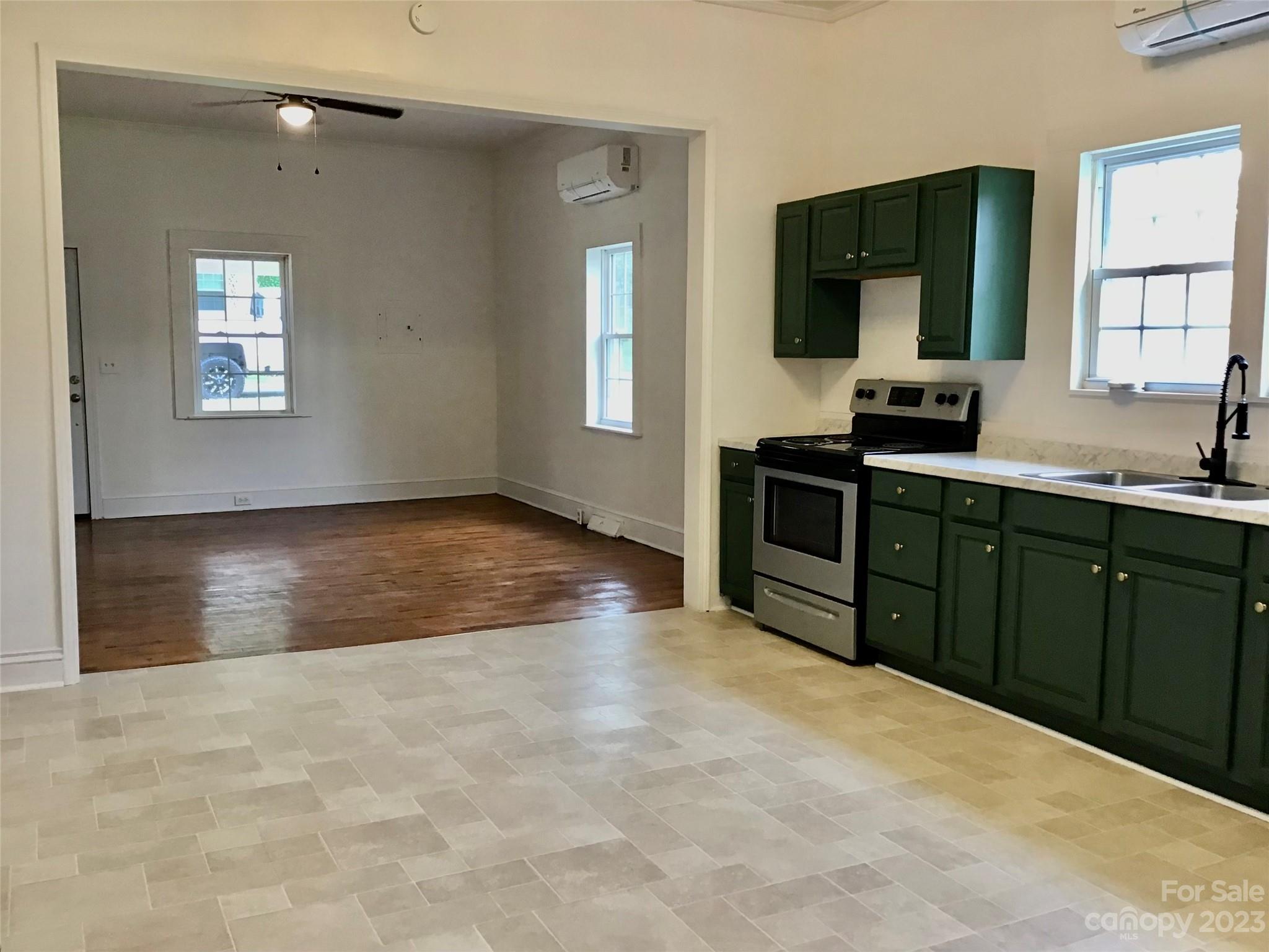 101 Alexander Road Stony Point, NC 28678 - Photo 5 of 15 a view of a kitchen with a sink cabinets and a window
