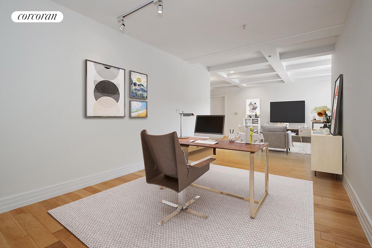 64-05 Yellowstone Boulevard, Unit 213 Queens, NY 11375 - Photo 7 of 15 a view of a livingroom with workspace and a couch