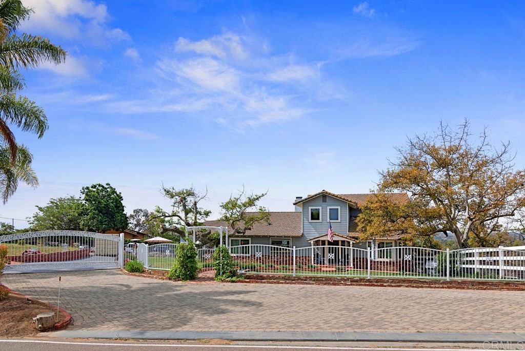 3631 Alta Vista Drive Fallbrook, CA 92028 - Photo 1 of 1 a front view of a house with a yard
