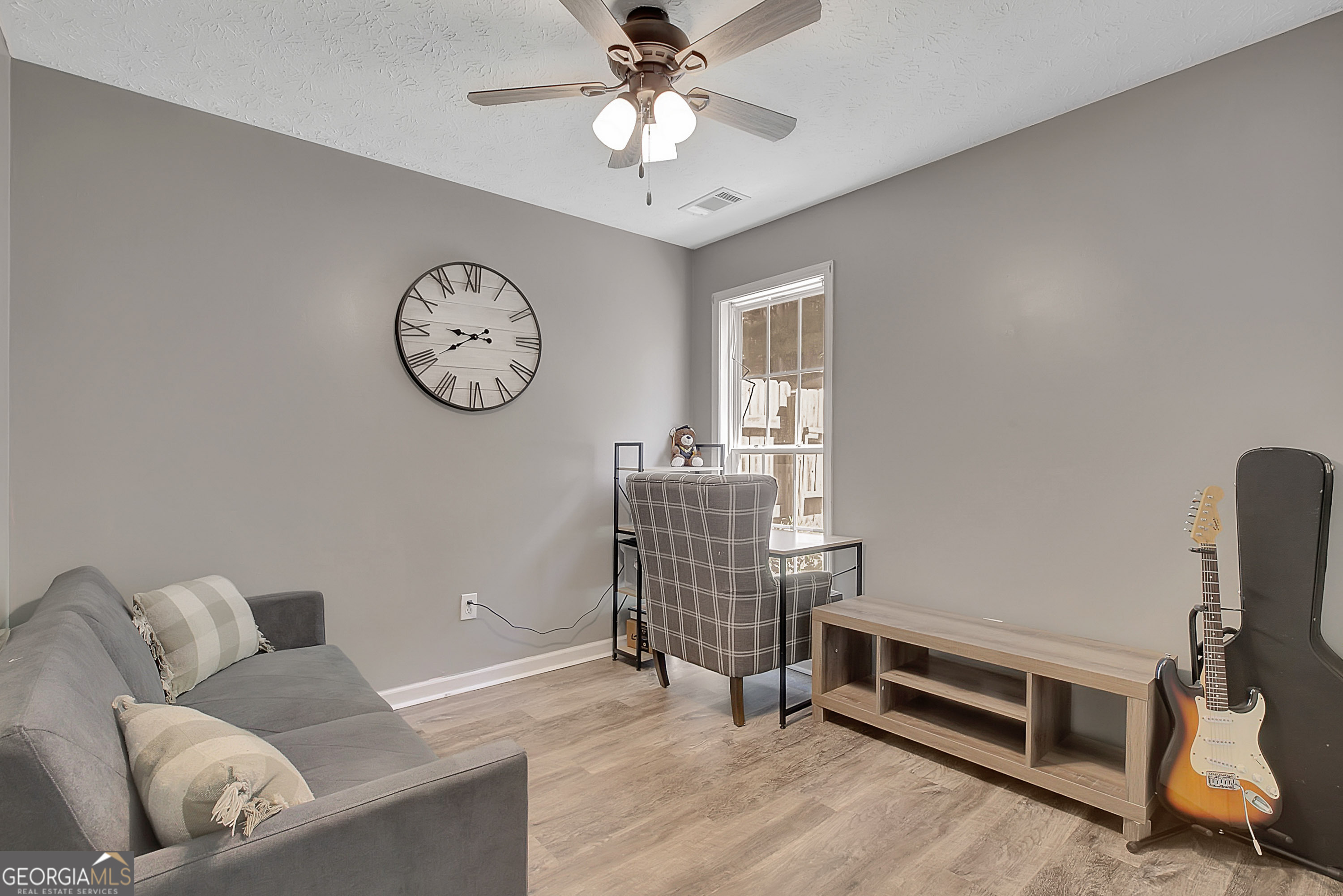 229 John Lovelace Road LaGrange, GA 30241 - Photo 35 of 59 a living room with furniture and a window