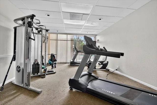 a view of a room with gym equipment