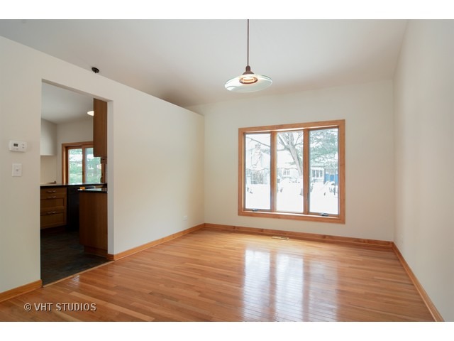 239 Leith Way Cary, IL 60013 - Photo 5 of 16 a view of an empty room with a window