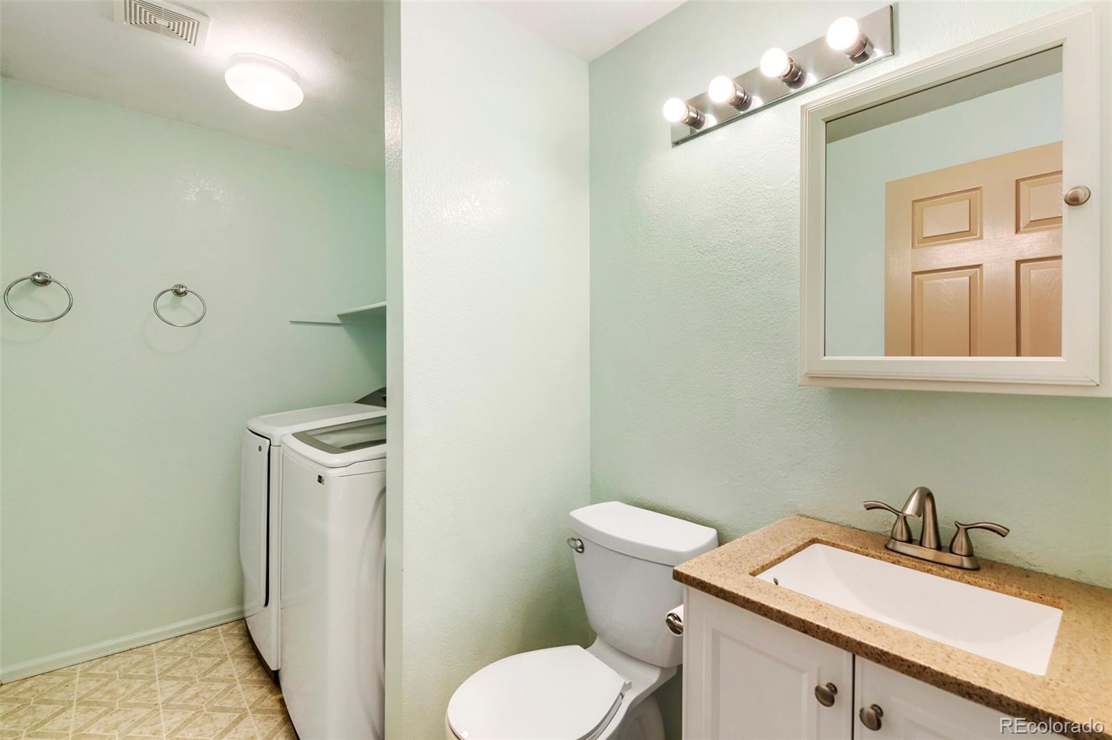 13400 Raritan Street Denver, CO 80234 - Photo 19 of 32 a bathroom with a sink and a toilet