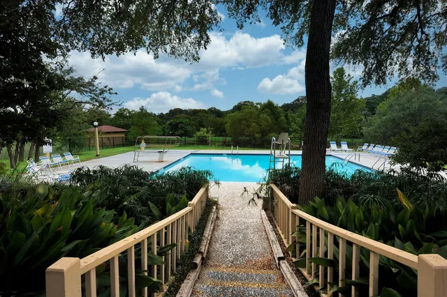 a view of a bench in a garden