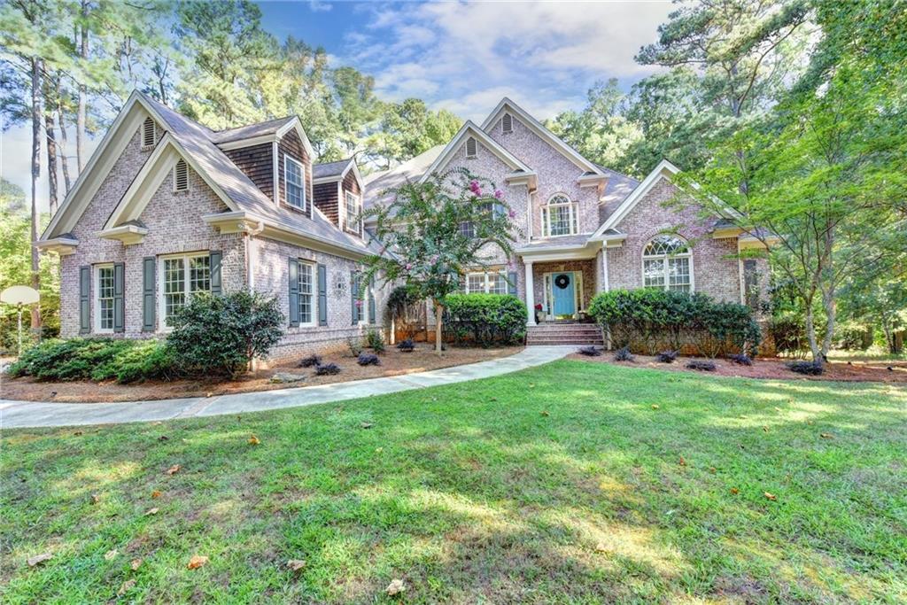 EXECUTIVE ESTATE on 4.17 acres.  All the upgrades you'd expect - Huge Master Suite on Main with limestone spa bath, HW floors, dramatic entrance, Office with double doors, banquet sized dining, custom mahogany cabinets, 2 FP, butler's pantry, large sep laundry with wall of cabs and SS sink, granite, custom ceilings and much more.  More than enough room for a pool.