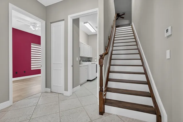 a kitchen with stainless steel appliances granite countertop a sink and stove top oven