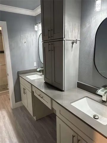 a view of a sink and a mirror