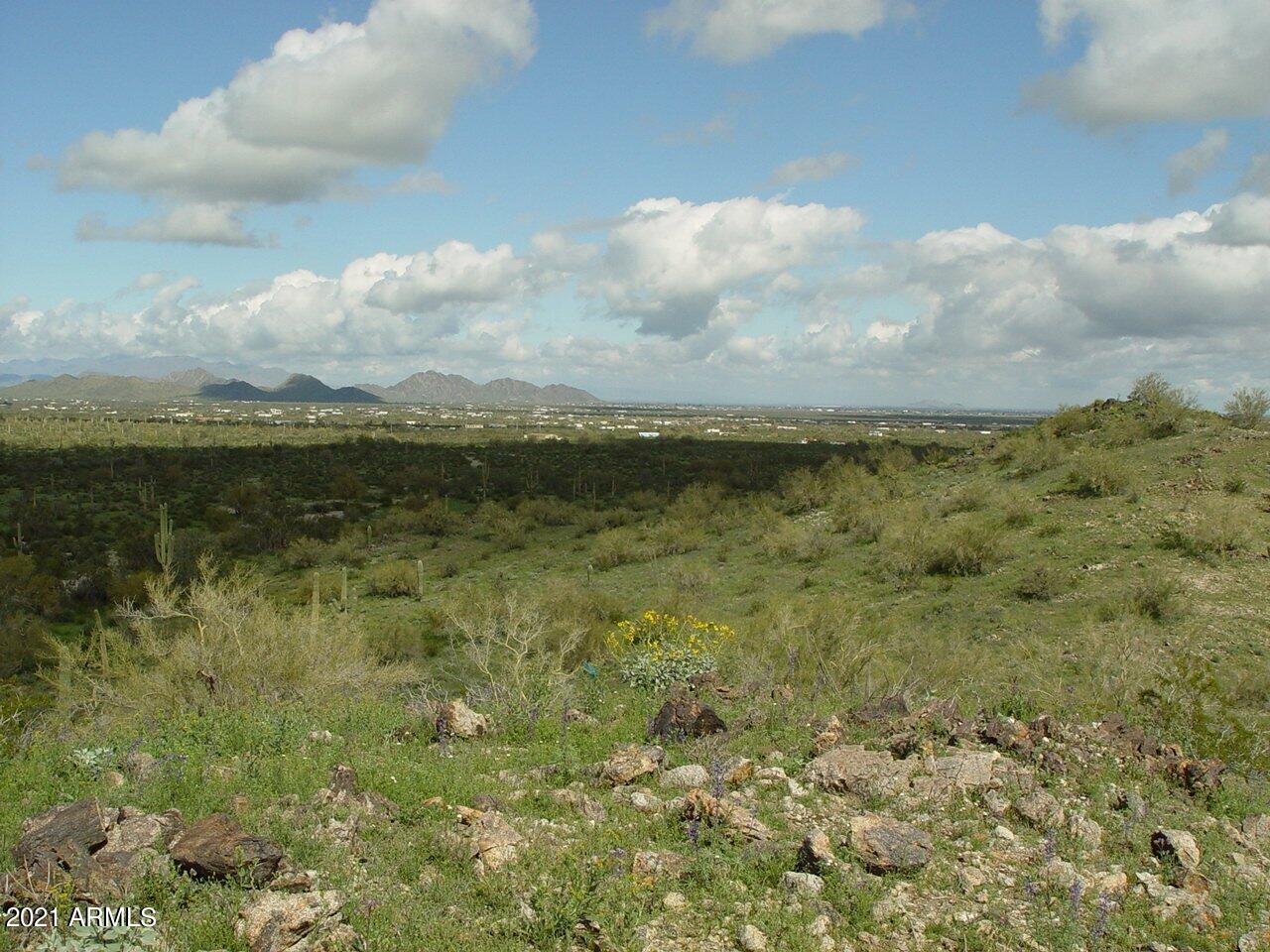 54214 West Whirly Bird Road, Unit 32 Maricopa, AZ 85139 - Photo 10 of 25 a view of an ocean and beach