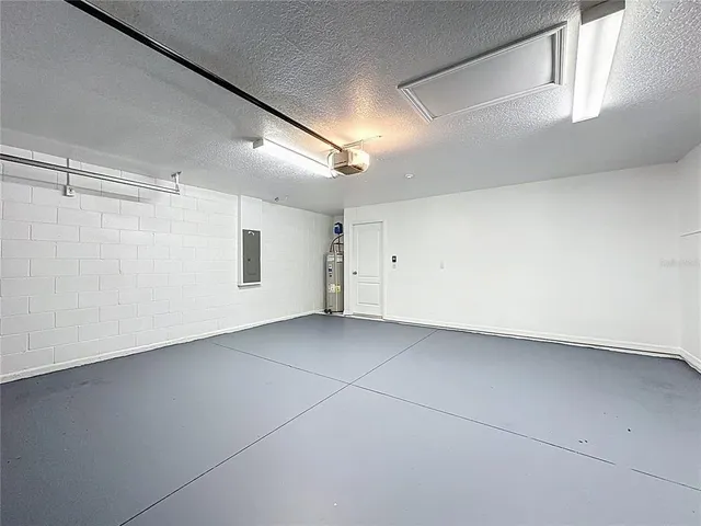 a view of a swimming pool with a yard