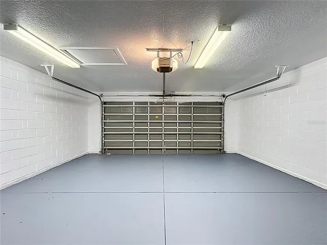 a view of a swimming pool with a yard