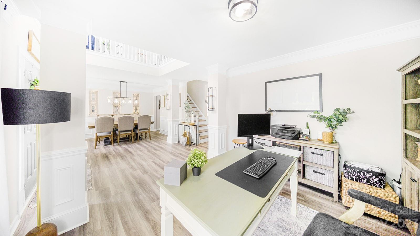 5207 Sunriver Road Gastonia, NC 28054 - Photo 8 of 46 a living room with furniture and a flat screen tv