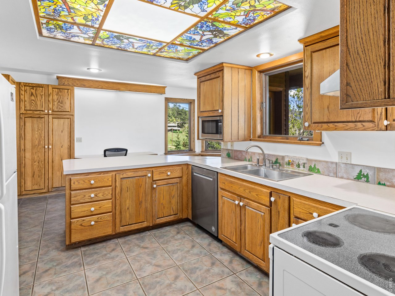 2180 Devils Gulch Road Estes Park, CO 80517 - Photo 19 of 40 Lots of kitchen storage