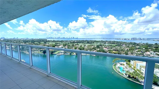 a view of a lake from a balcony