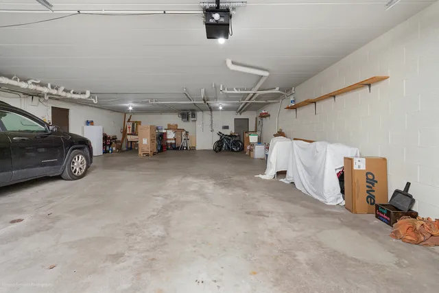 a view of a swimming pool and an outdoor seating
