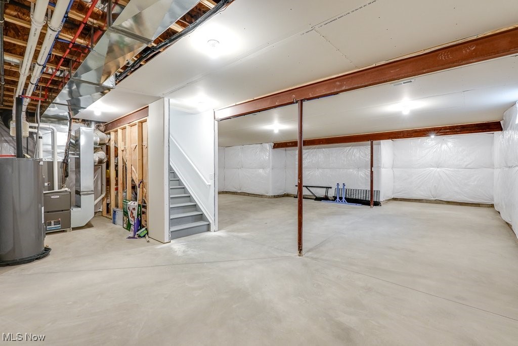 765 River Run Road Aurora, OH 44202 - Photo 33 of 35 Basement with water heater and heating unit