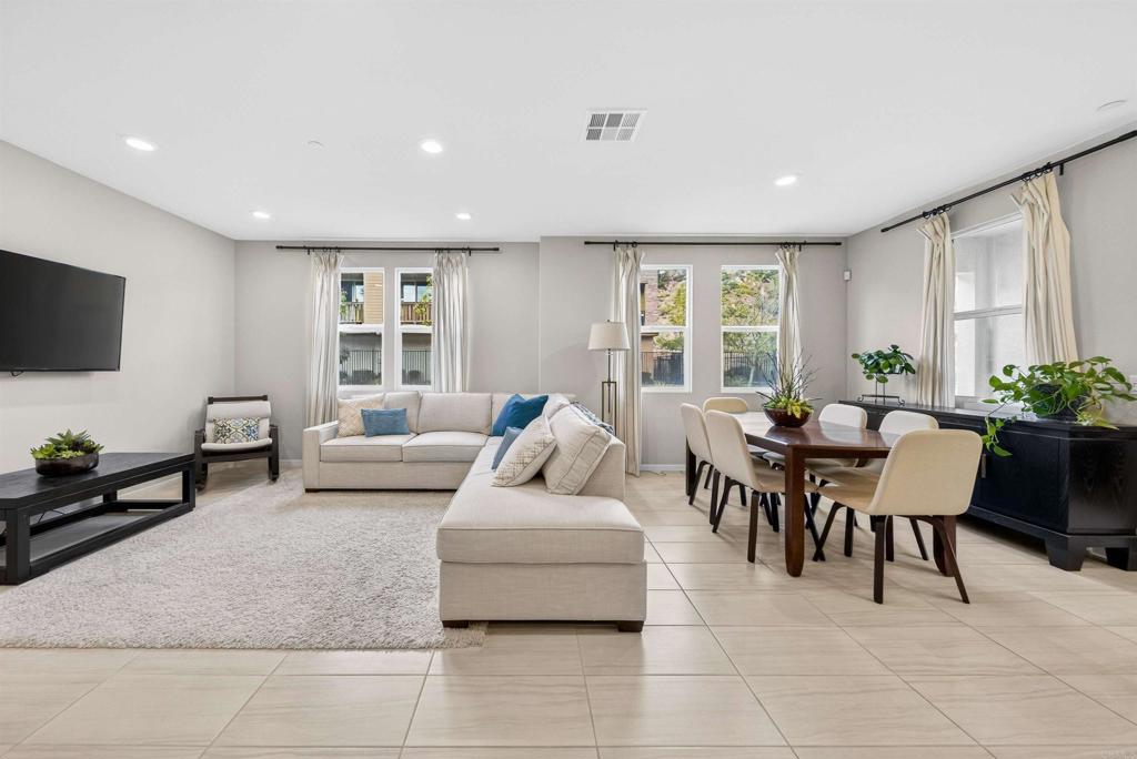 387 Mission Villas Road San Marcos, CA 92069 - Photo 2 of 45 a living room with furniture and a flat screen tv